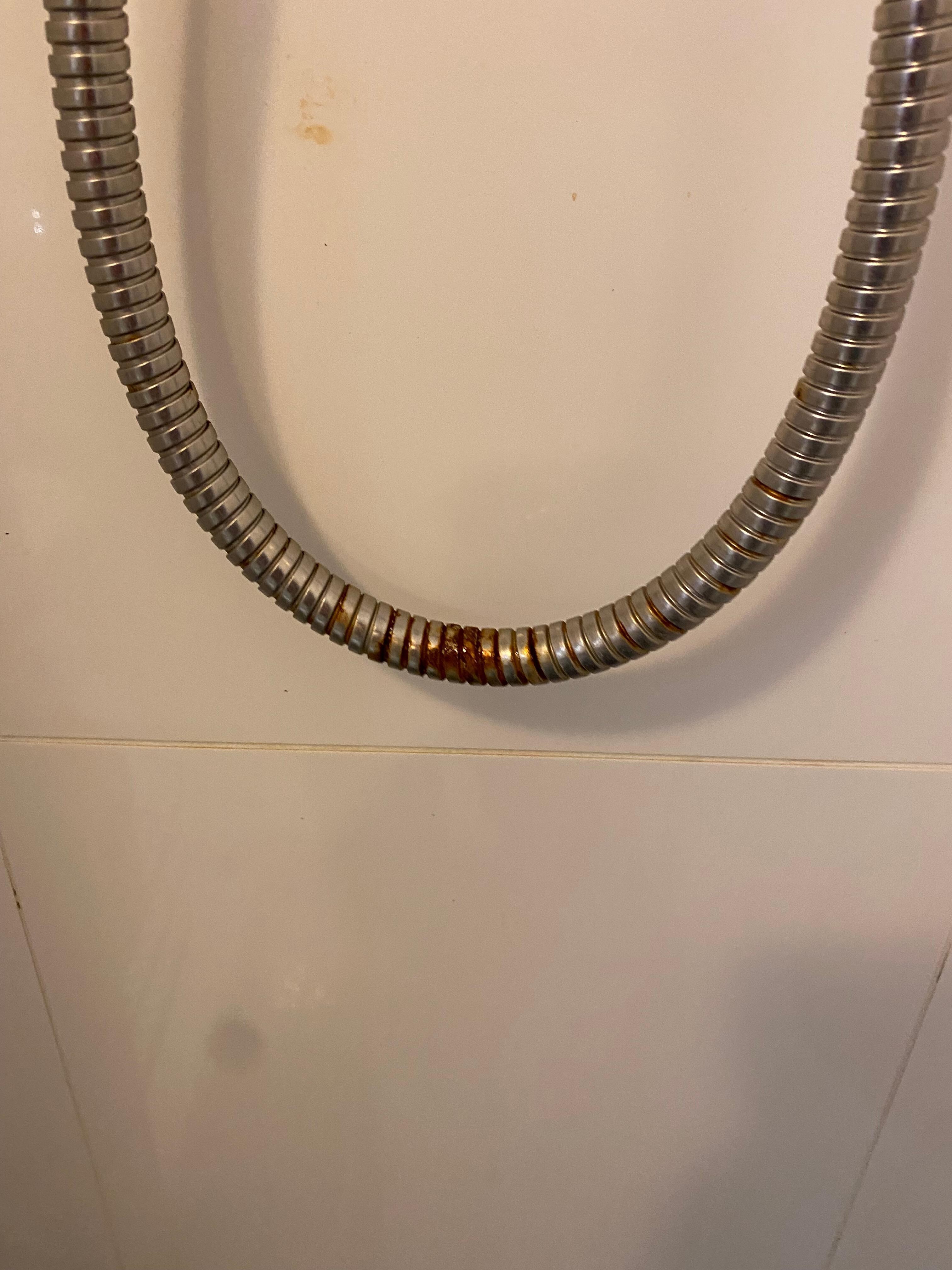 This is the rusted shower hose. Also the air conditioner doesn’t work 