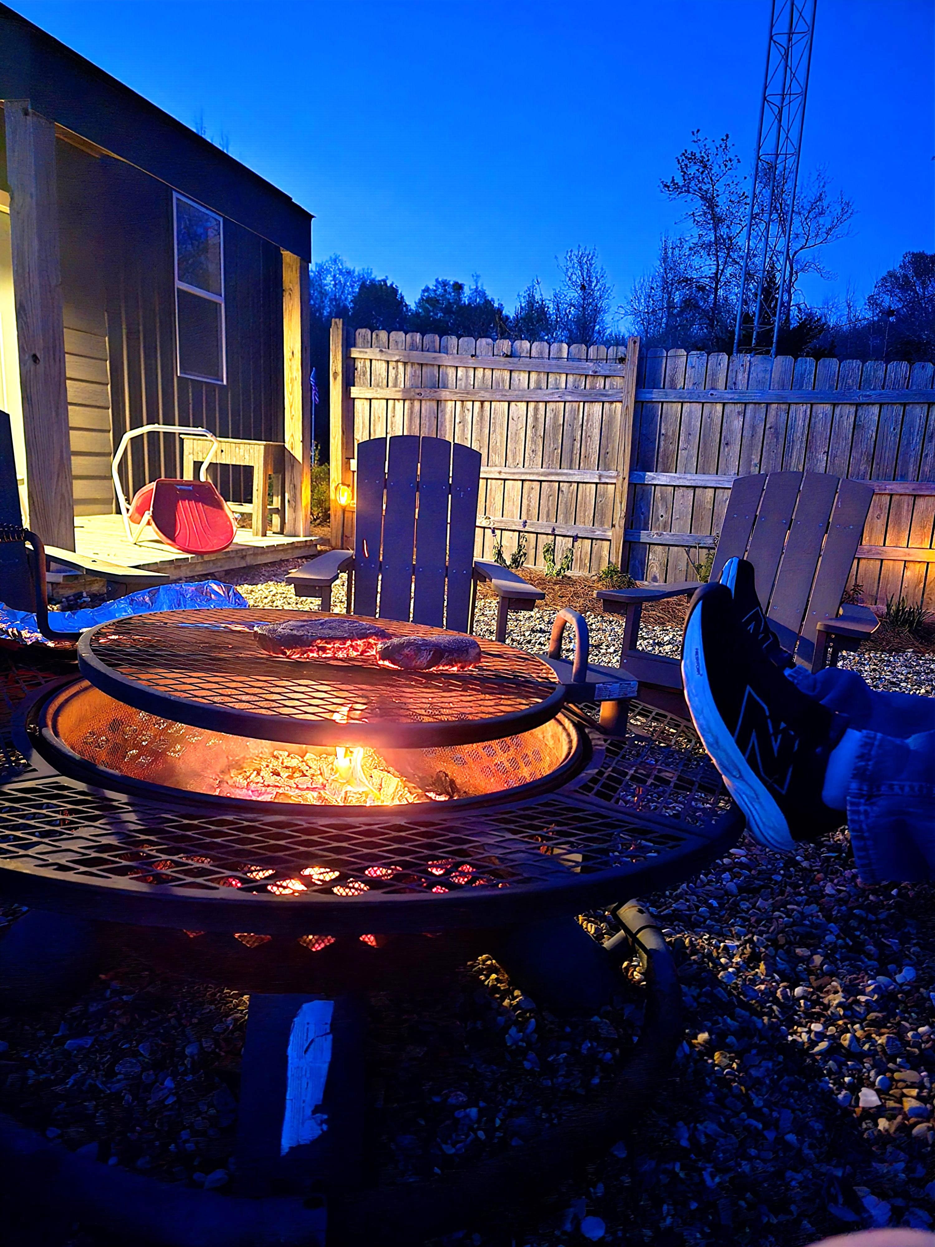 Steaks on with feet kicked up. 