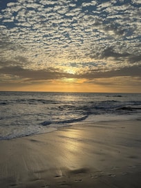 The beach that is just steps away from the unit.