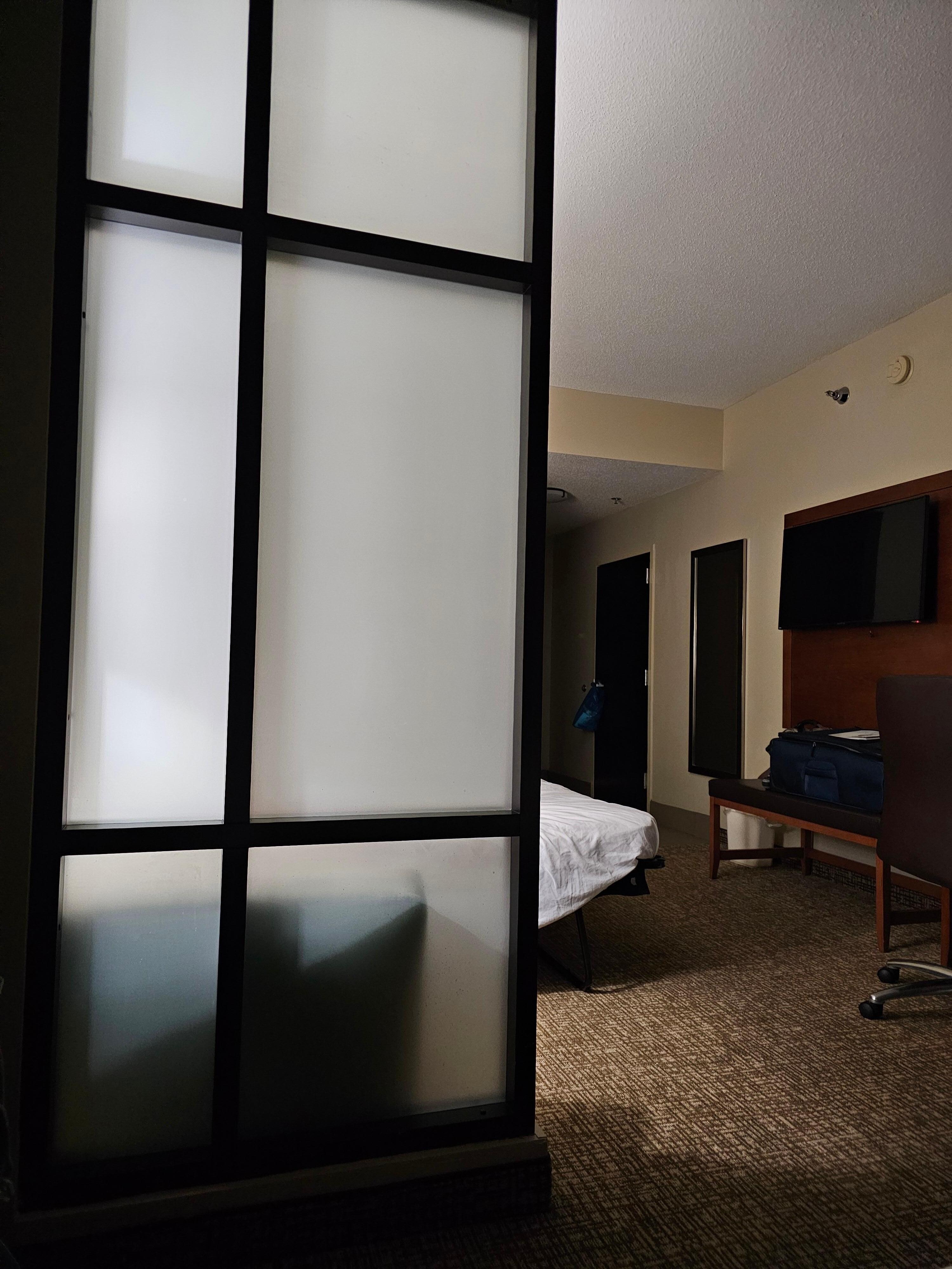 Room with partial divider (fixed, not movable)