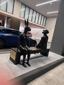 "The Friends Forever Bench" Sculpture in Valet area at Gale Miami by the artist Gillie and Marc