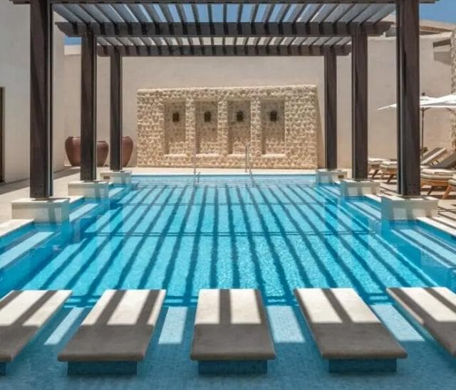 The Chedi pool… so refreshing but heated so no shock going in for a dip and a few laps. Call button service at your lounge chair. Cool washcloths to refresh you. Icy fruit and cool water brought to you. 