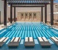 The Chedi pool… so refreshing but heated so no shock going in for a dip and a few laps. Call button service at your lounge chair. Cool washcloths to refresh you. Icy fruit and cool water brought to you.