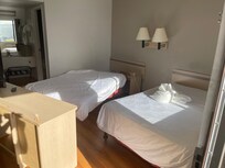 We tipped the mattresses back over to get around the room