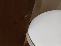 Door doesn't clear the toilet, you have to force it open.