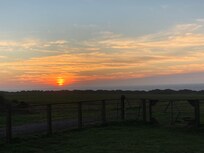 View of the sunset from the front door.