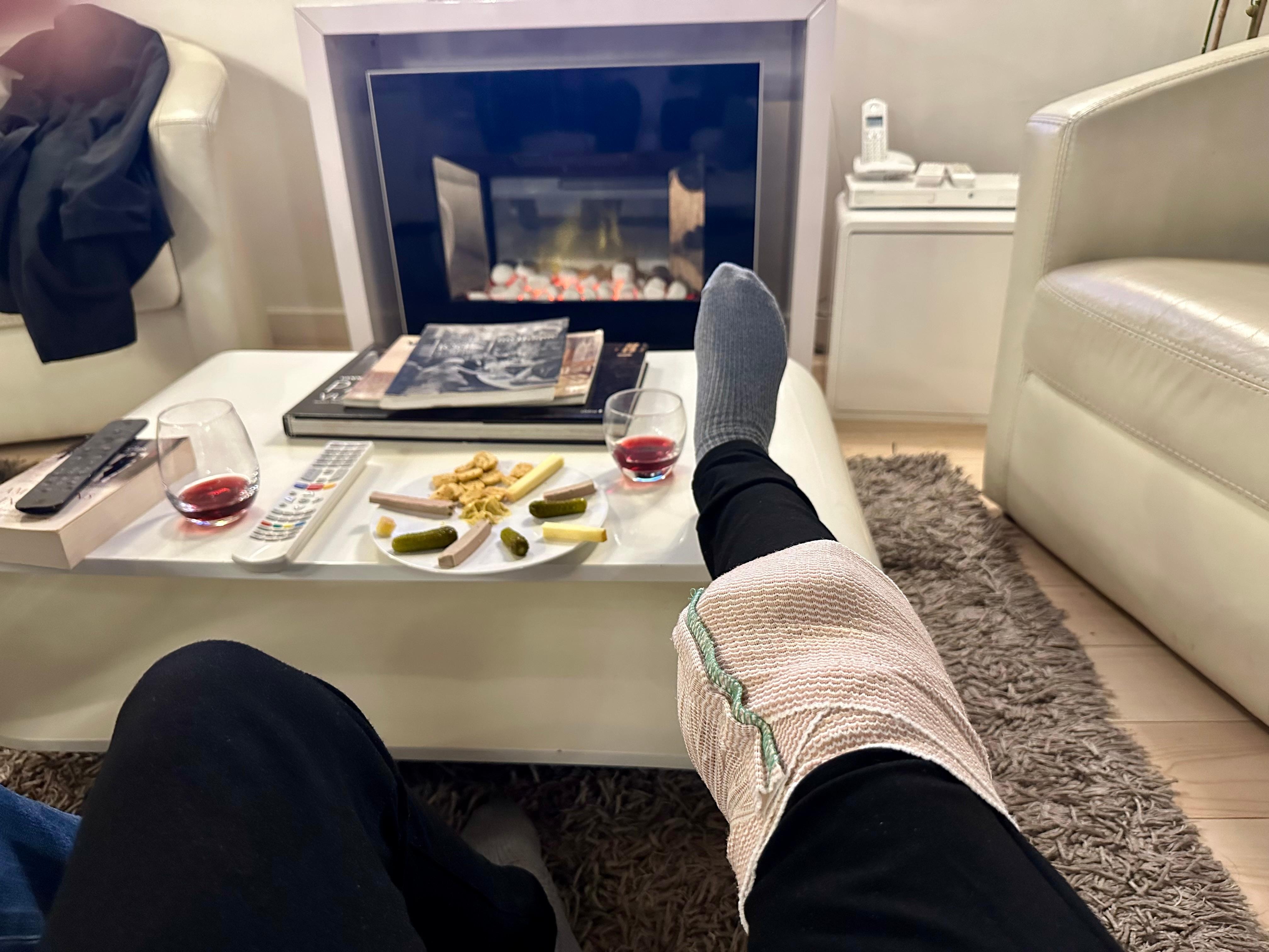 Icing my knee  y the fire!