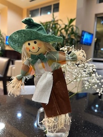 Scarecrow welcoming you at a breakfast lounge area