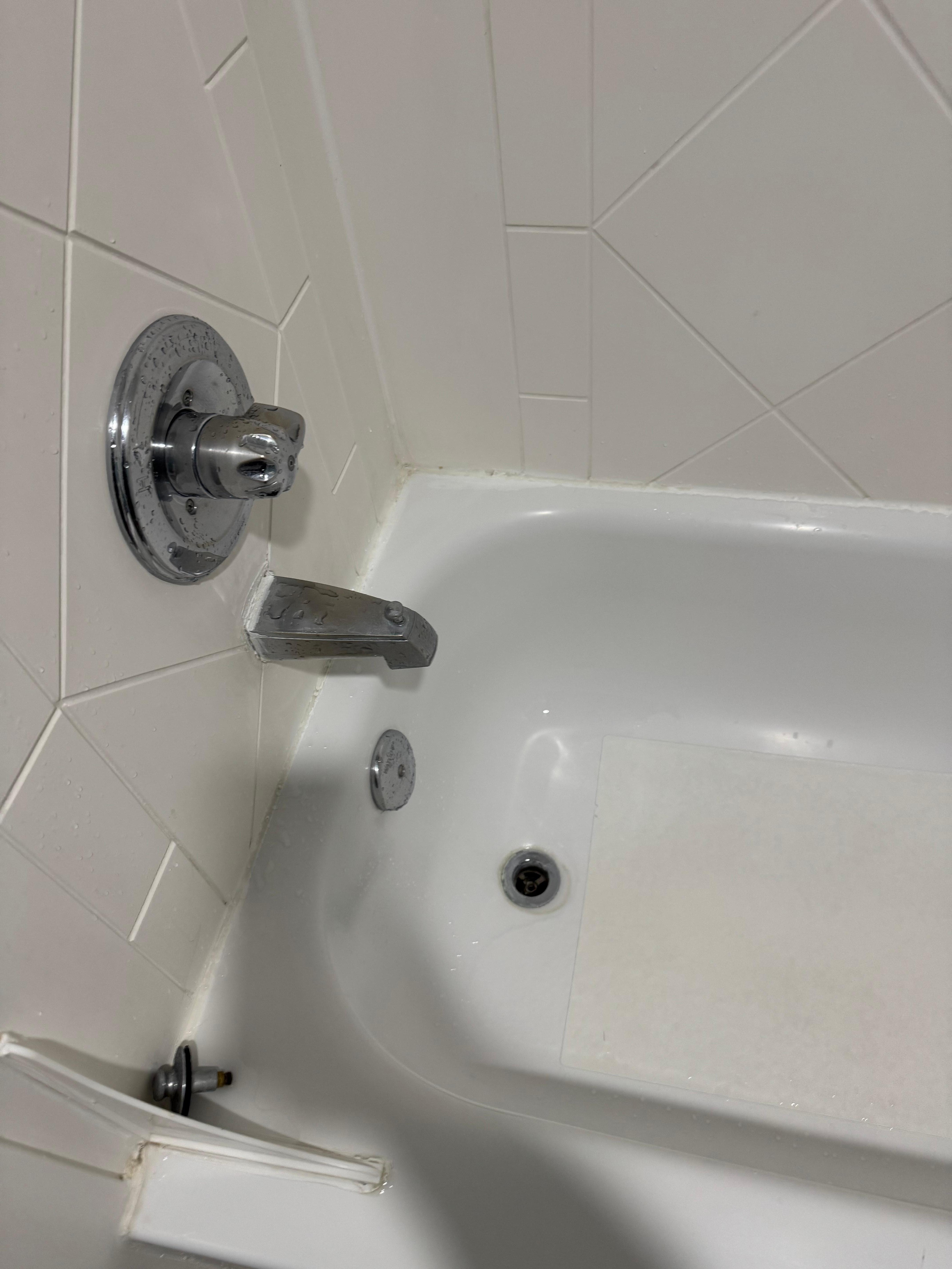 Broken drain, tub spout disconnected stained ahower