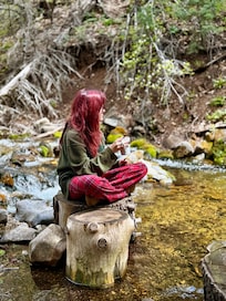 My daughters favorite part of the cabin was hanging out on the cut logs in the steam!