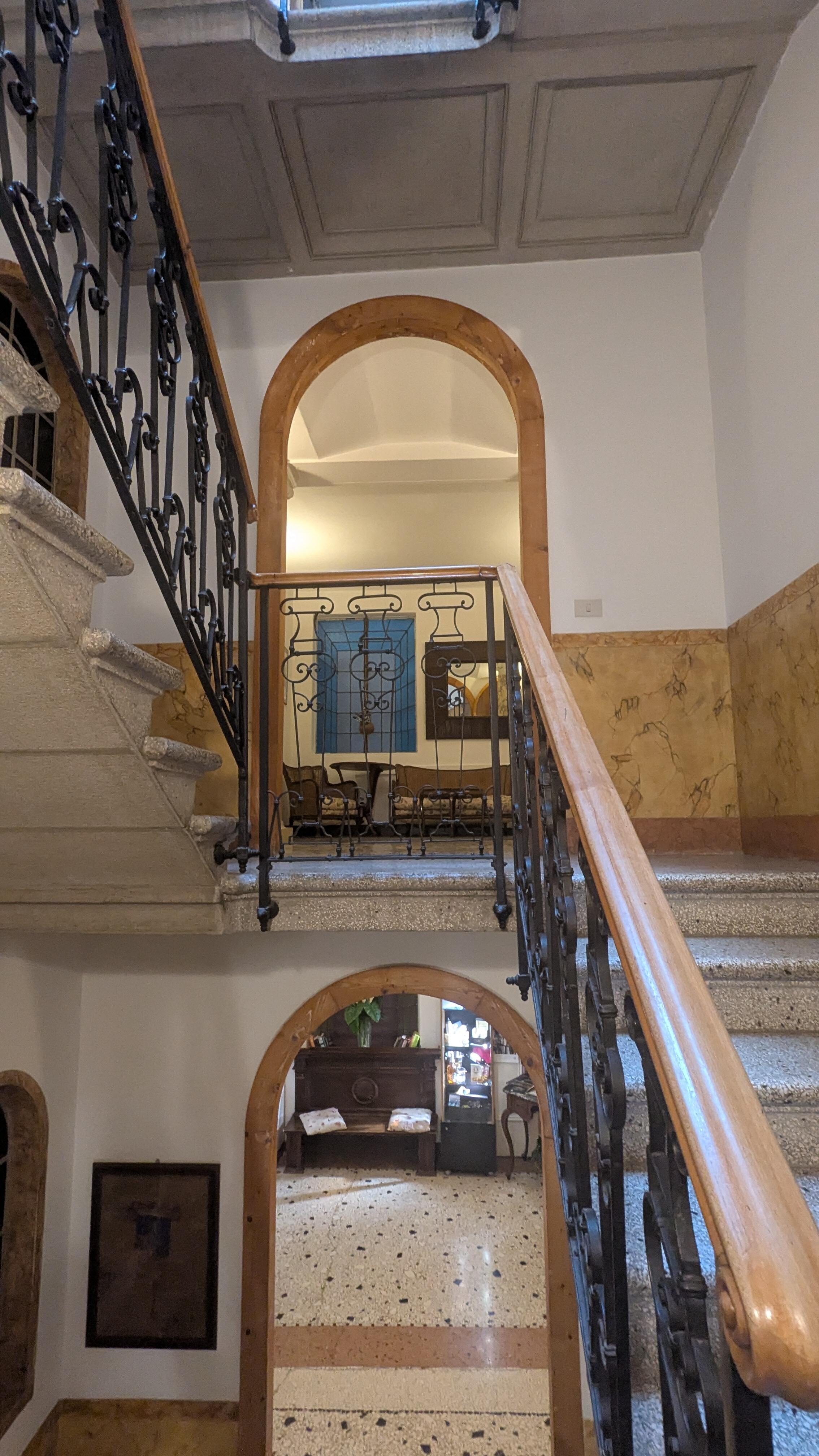 Reception on first floor and short flight of stairs to bedroom.