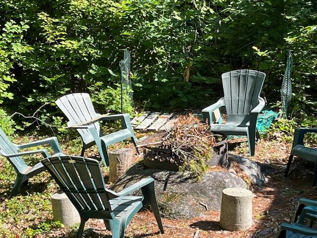 Fire pit that needs to be cleared out to ensure safety and comfort.