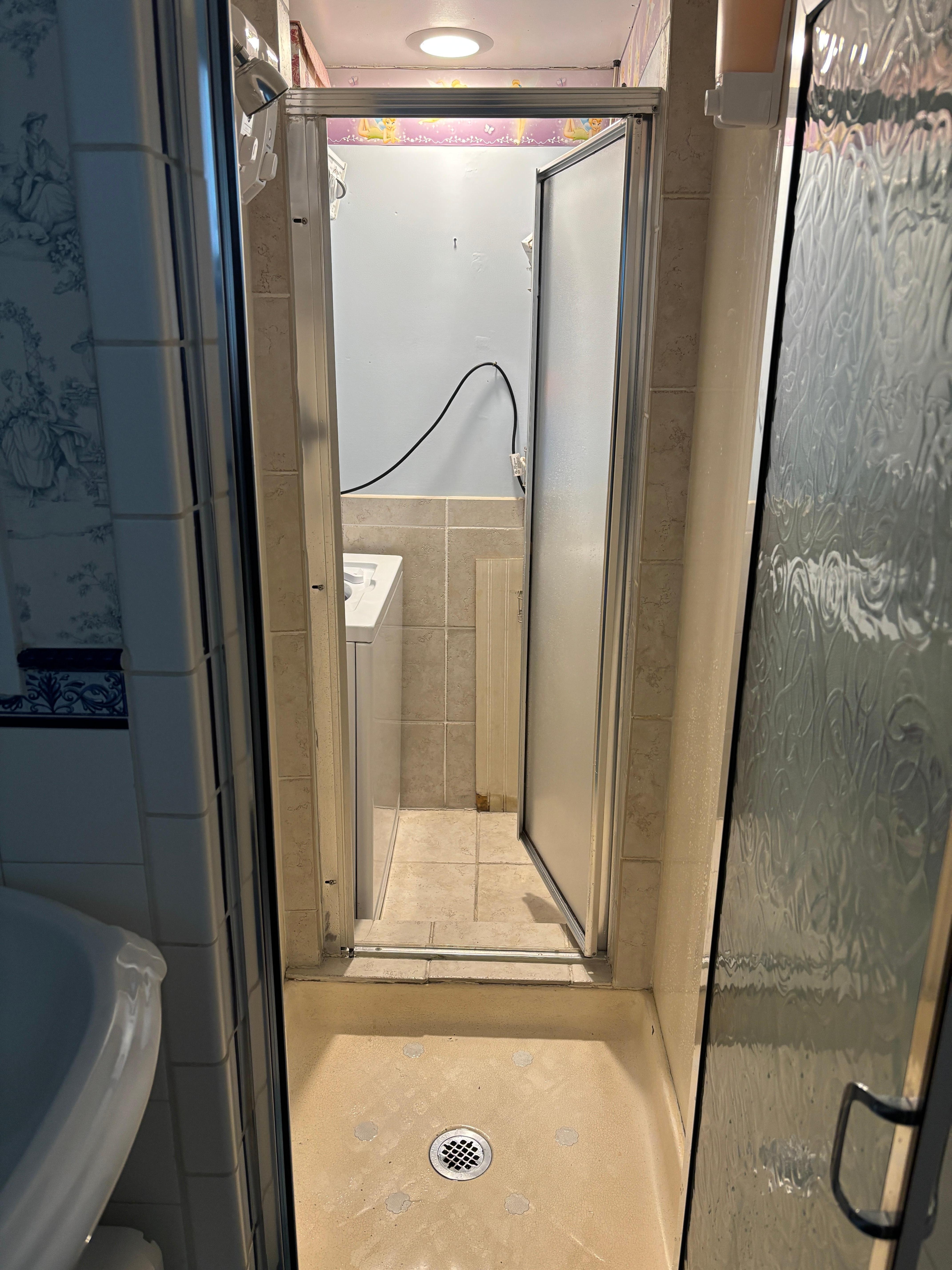 Walk-through shower to laundry.