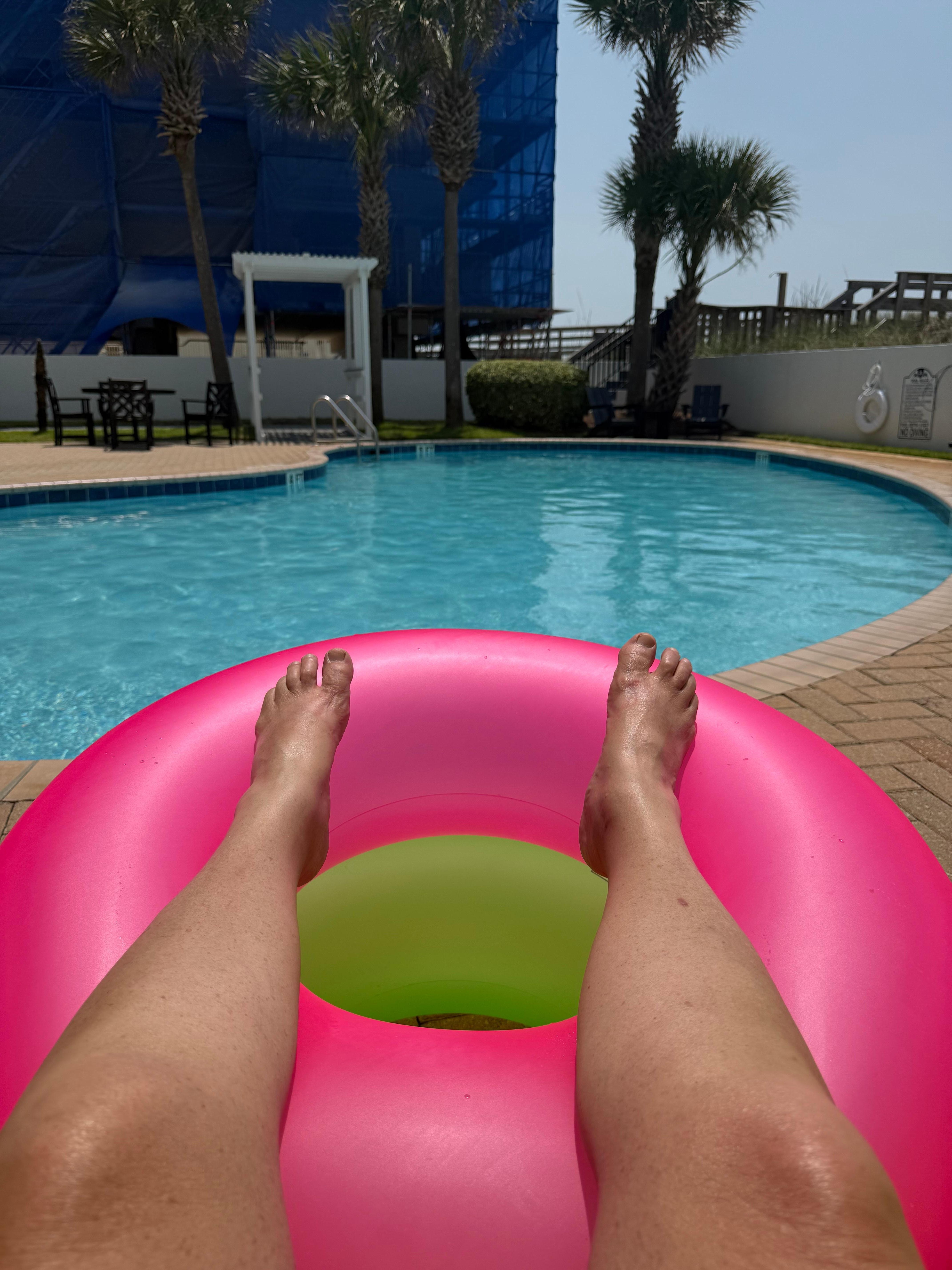 Condo pool area
Beach access is tight by the palm trees!
