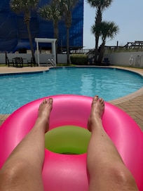 Condo pool area
Beach access is tight by the palm trees!
