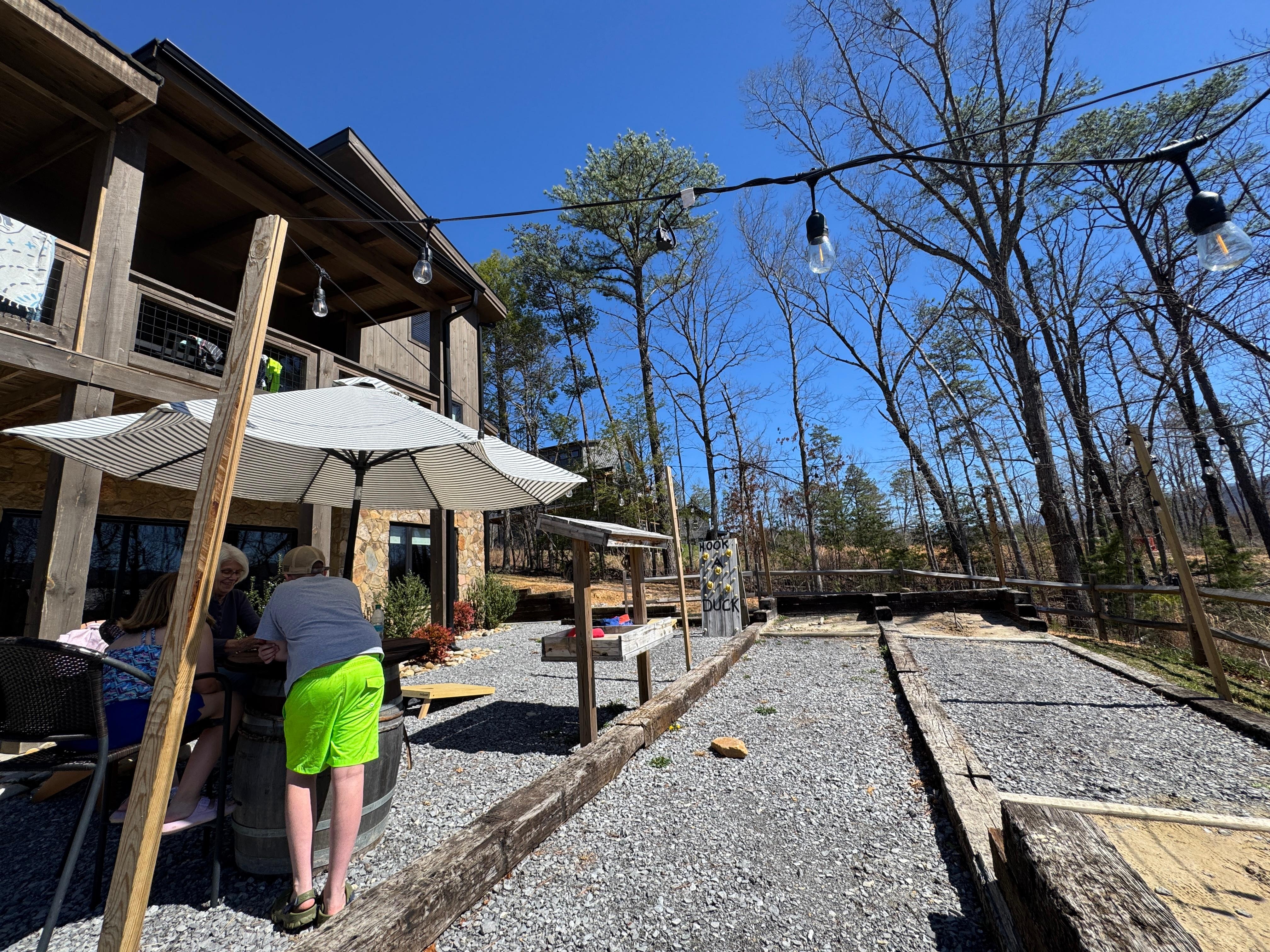 Corn hole, ring a duck, lots of seating, great fire pit area too! 