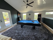 Game room had a pool table, darts and an arcade game