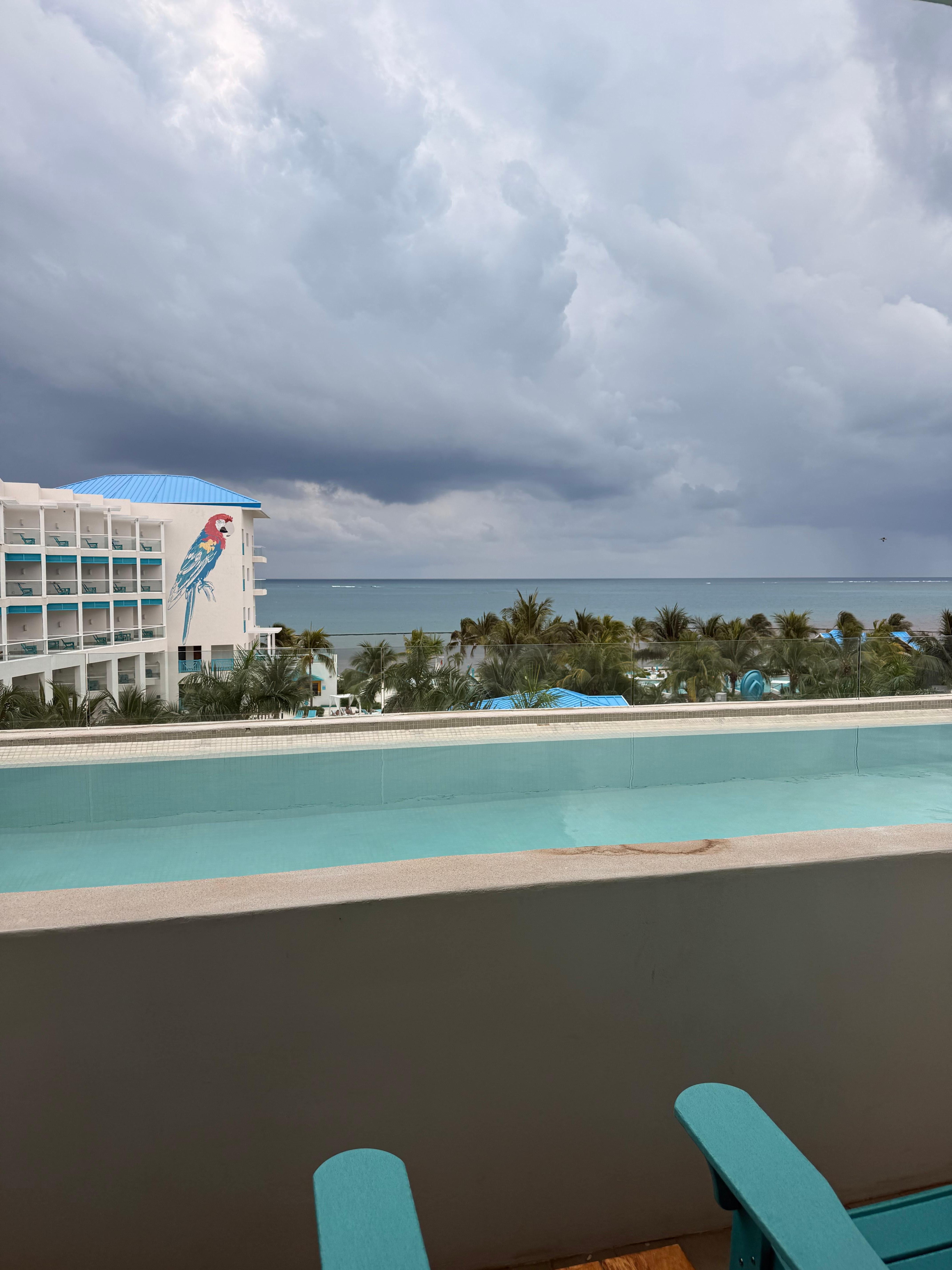 View from our room with our pool and ocean view