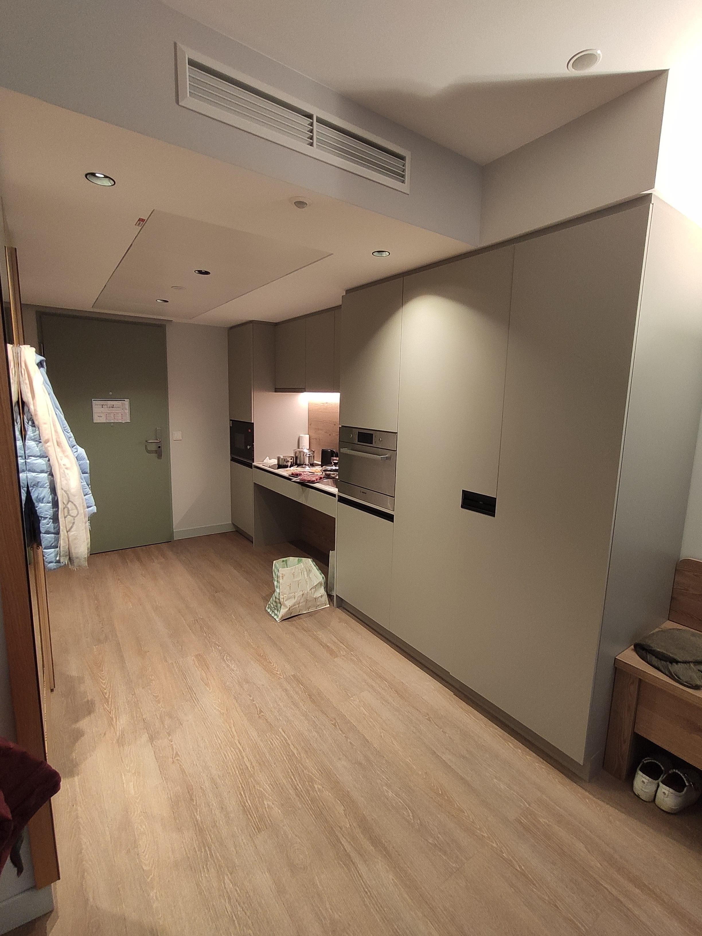 Spacious room with fully equipped kitchen.