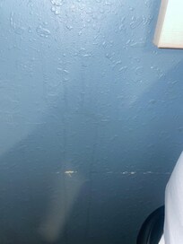 Like every wall, stained and damaged