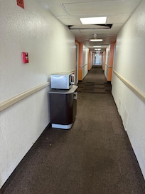 Condition of hallway in front of rooms