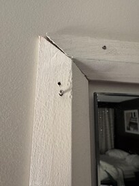 Bedroom door trim, nail sticks out