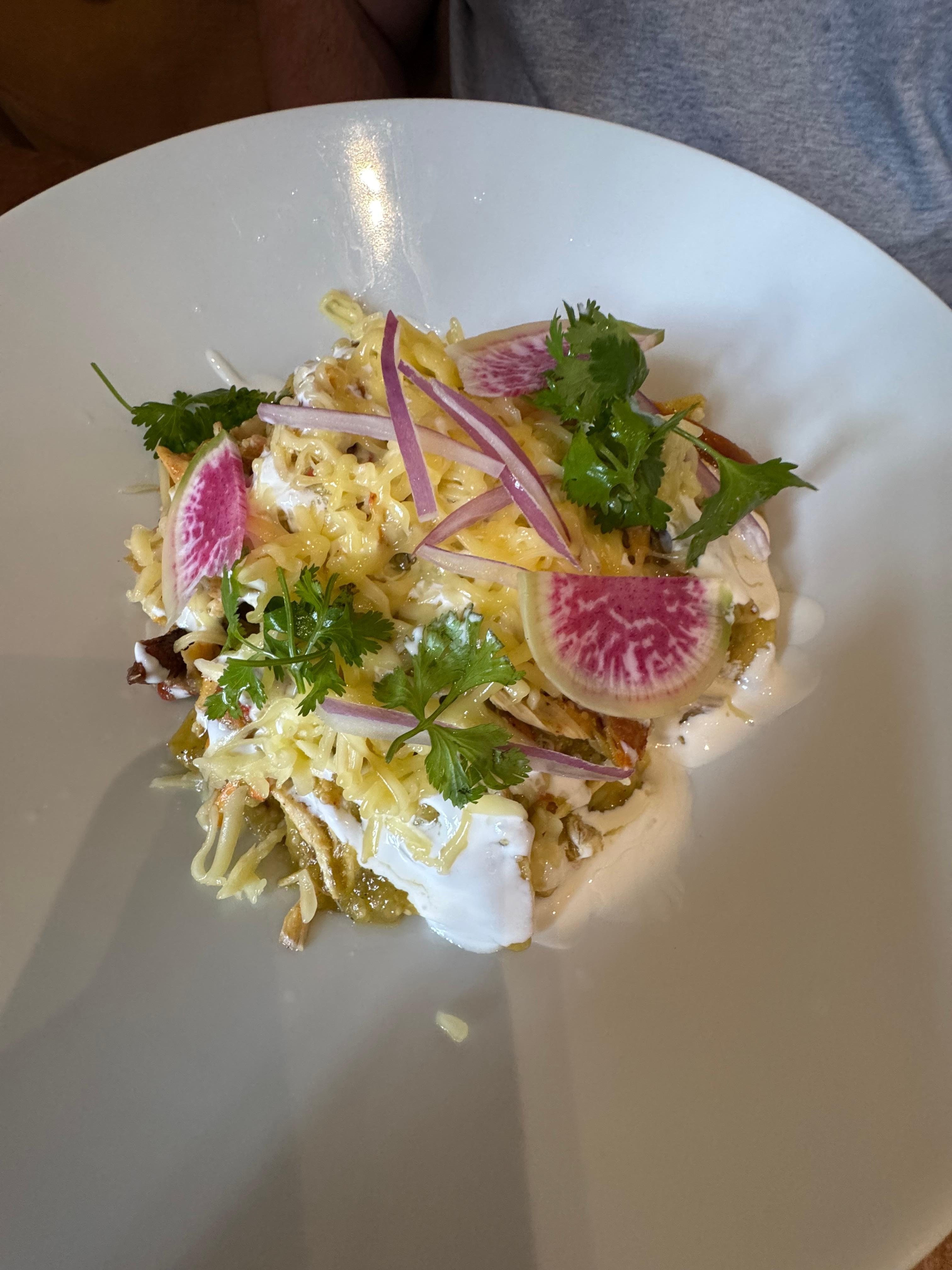 Chilaquiles with chicken so delicious and the presentation so pretty 