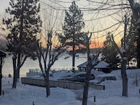 Sunrise over Big Bear Lake from our patio.