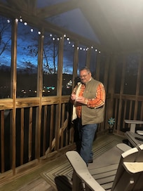 Eating apple cake on the screened in back porch! Love the lights!