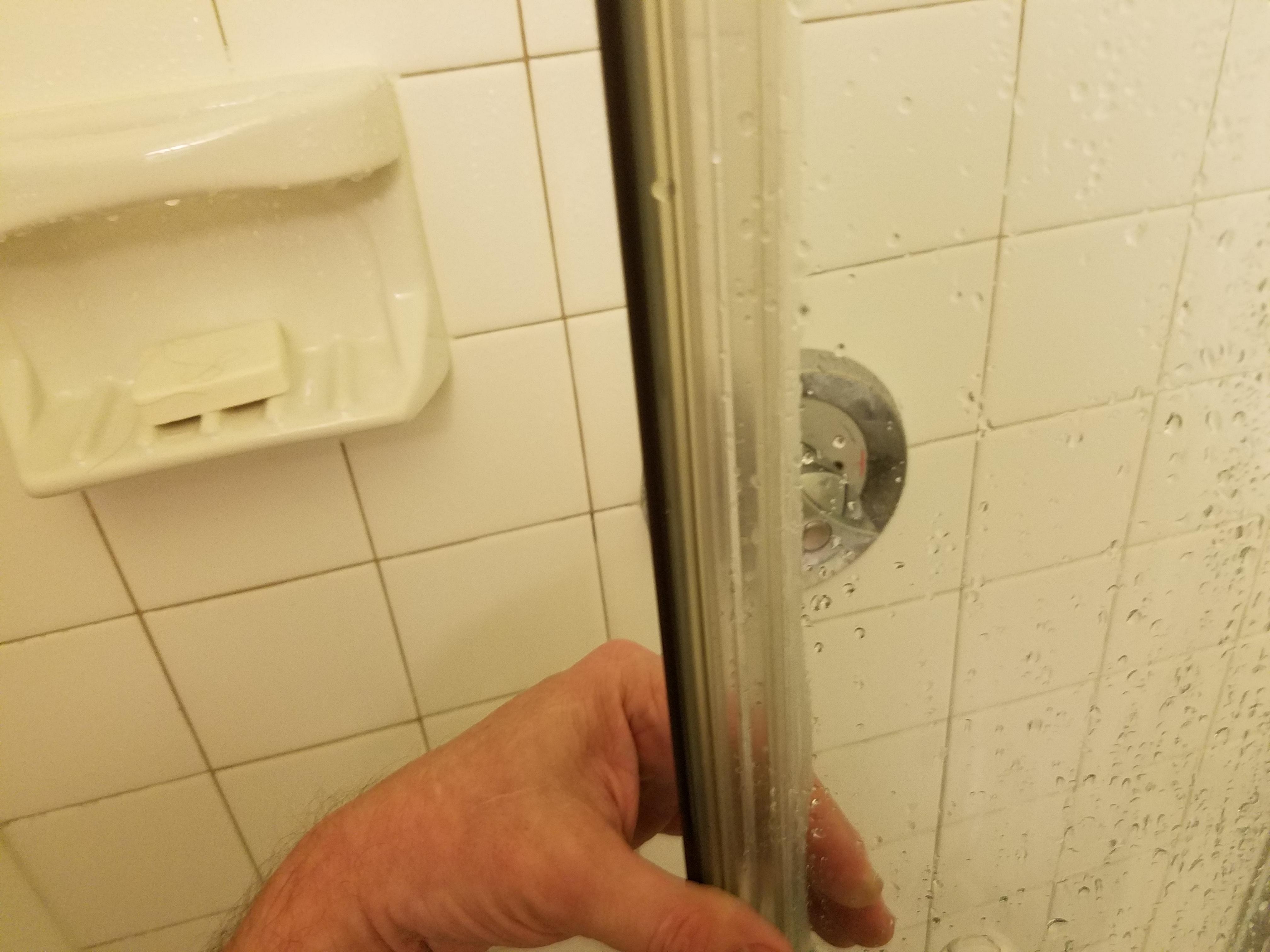 See if you can fit in this shower - door opens inward :>|