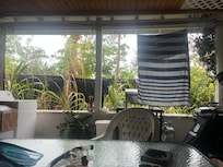 Looking out back porch from table