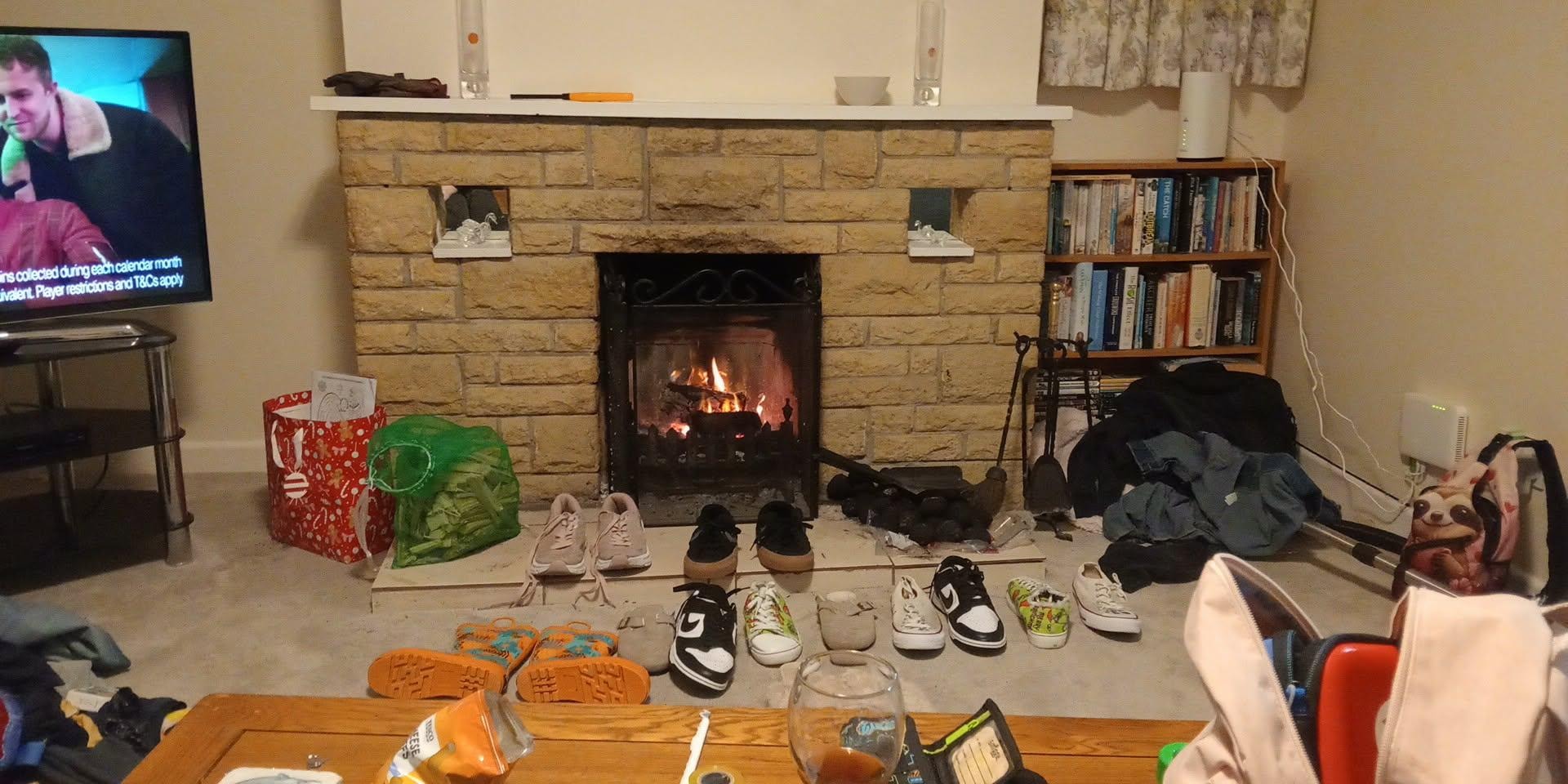 Preparing to leave and the fireplace did well to dry out shoes 