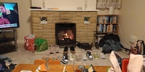 Preparing to leave and the fireplace did well to dry out shoes