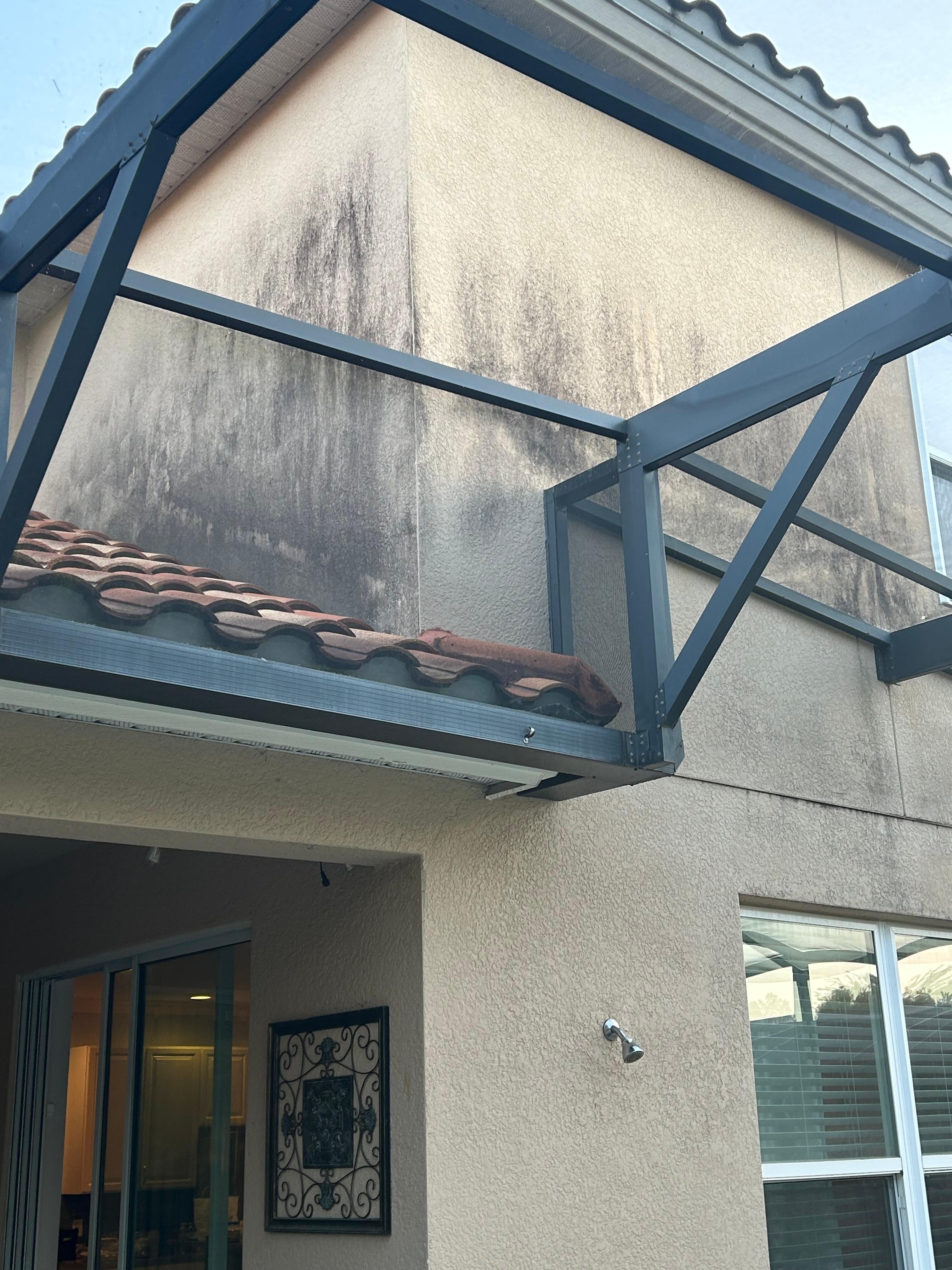 Stucco black with dirt
