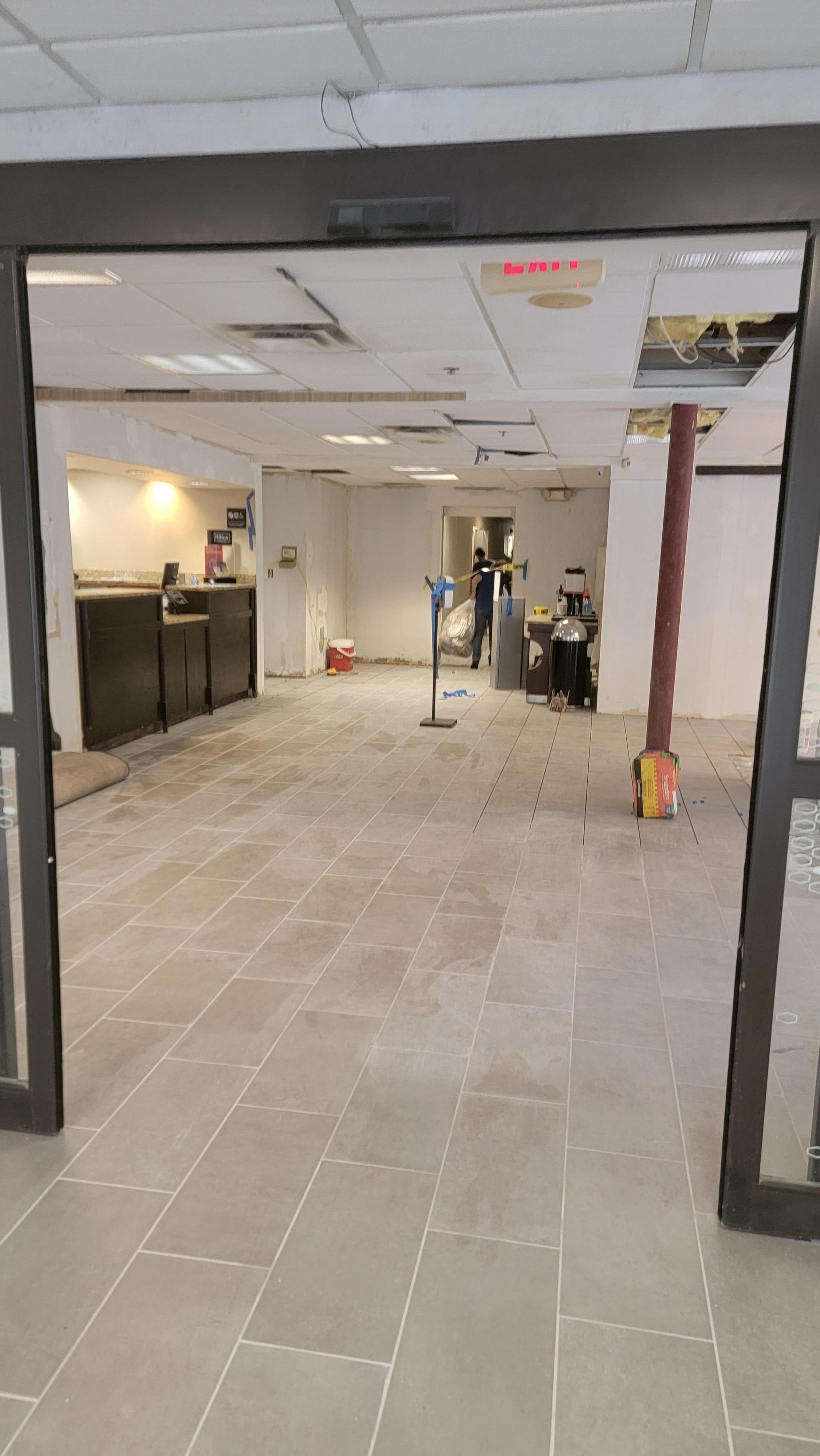 Lobby- Holes in the ceiling and construction dust everywhere. 