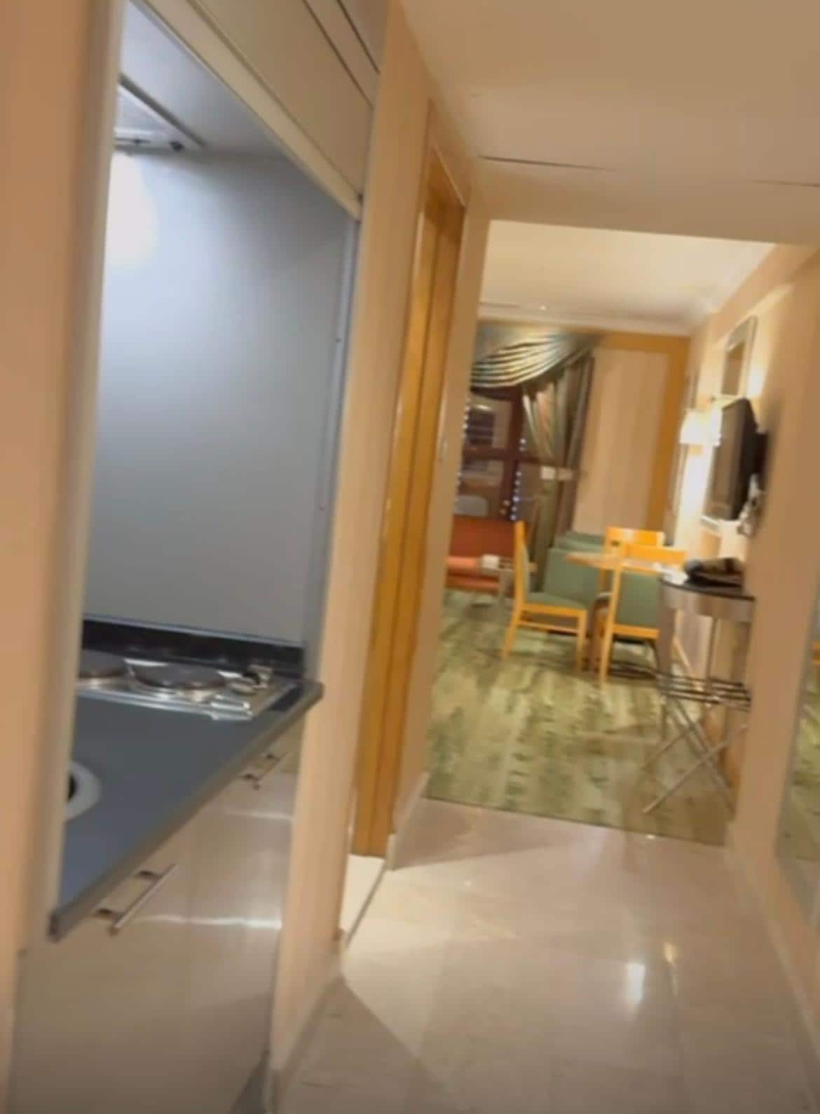 Entrance to the room. On the left a tiny kitchenette and bathroom 