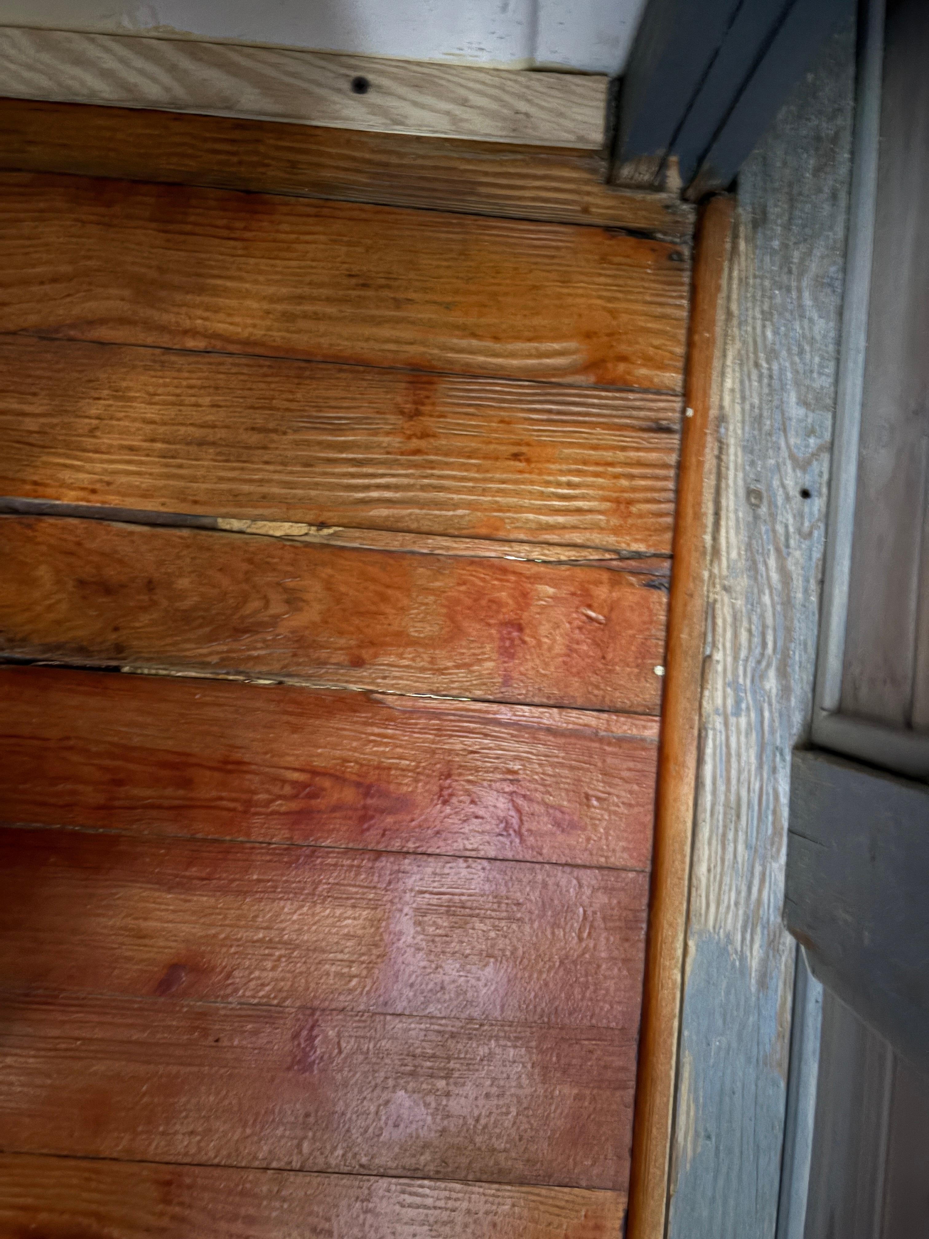 Another view of toilet floor .