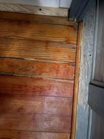 Another view of toilet floor .