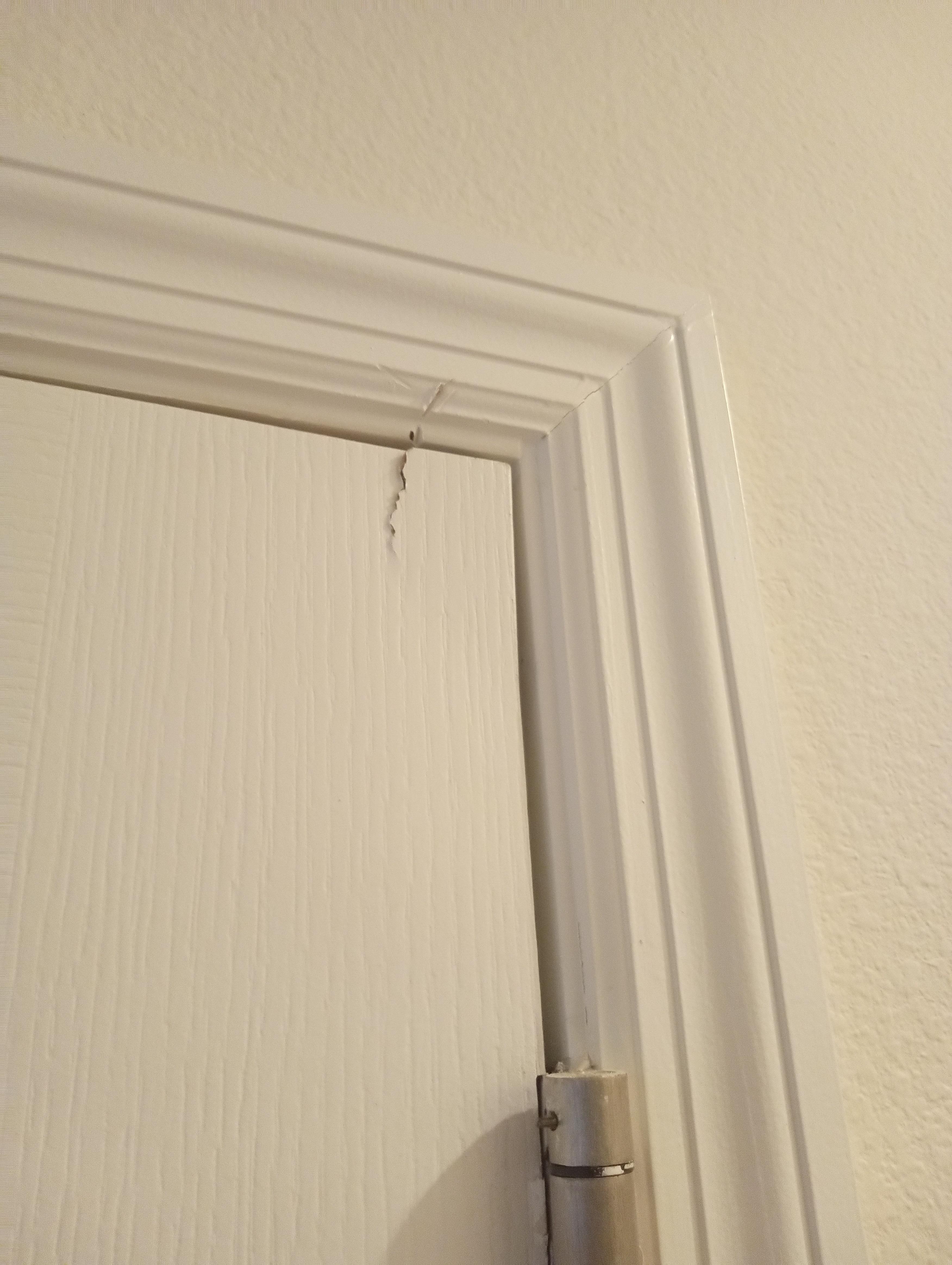 Garage man-door was broken.