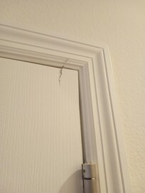 Garage man-door was broken.