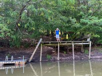 Nice floating ramp to tie up canoe but difficult to get owners kayaks or canoe down to the lake.