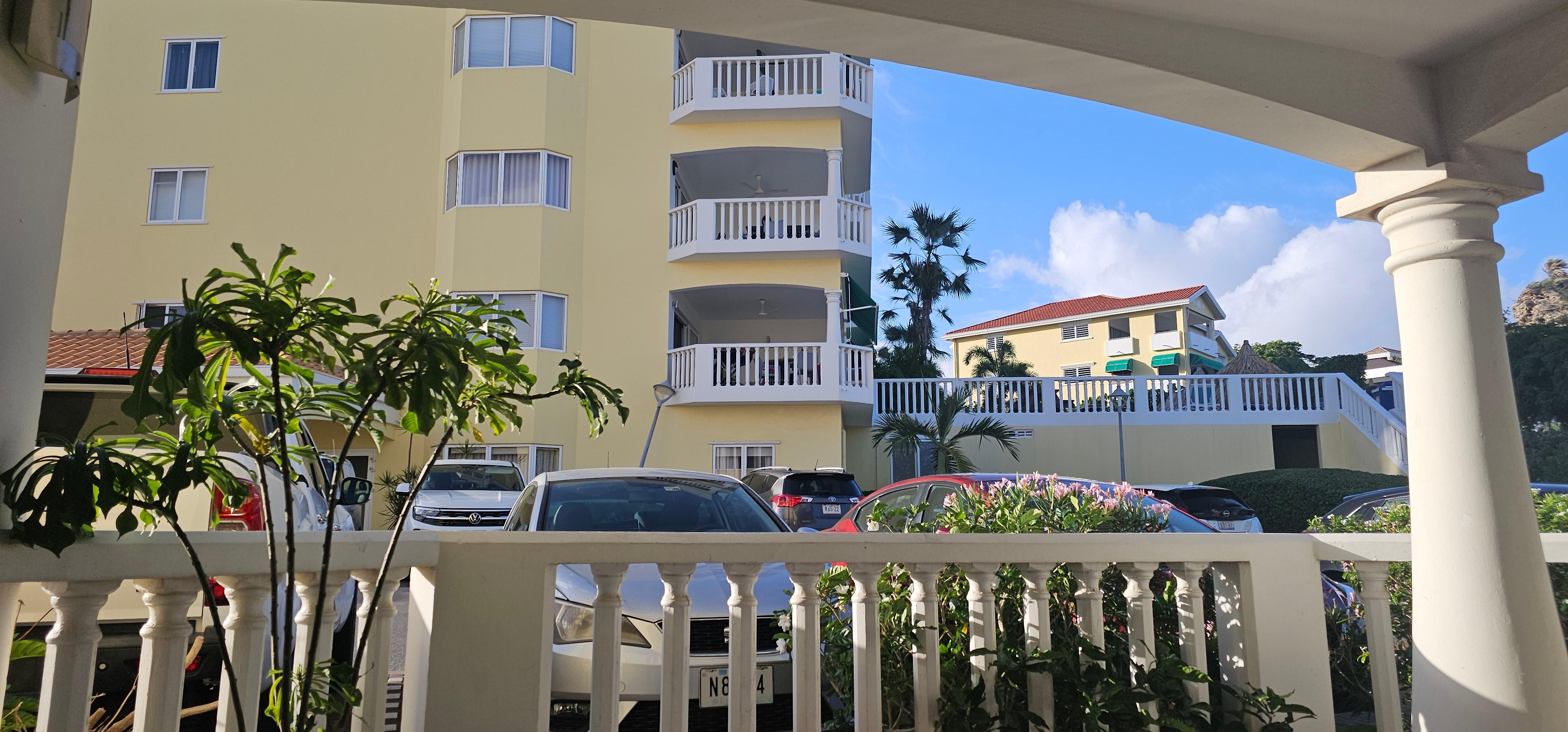 View from balcony. Faces second building. You can see the steps up to the pool to the right of the picture.