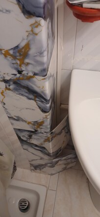 Stick on tiles losing adhesive.