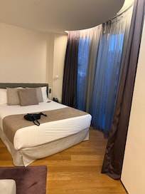 Bed and large windows