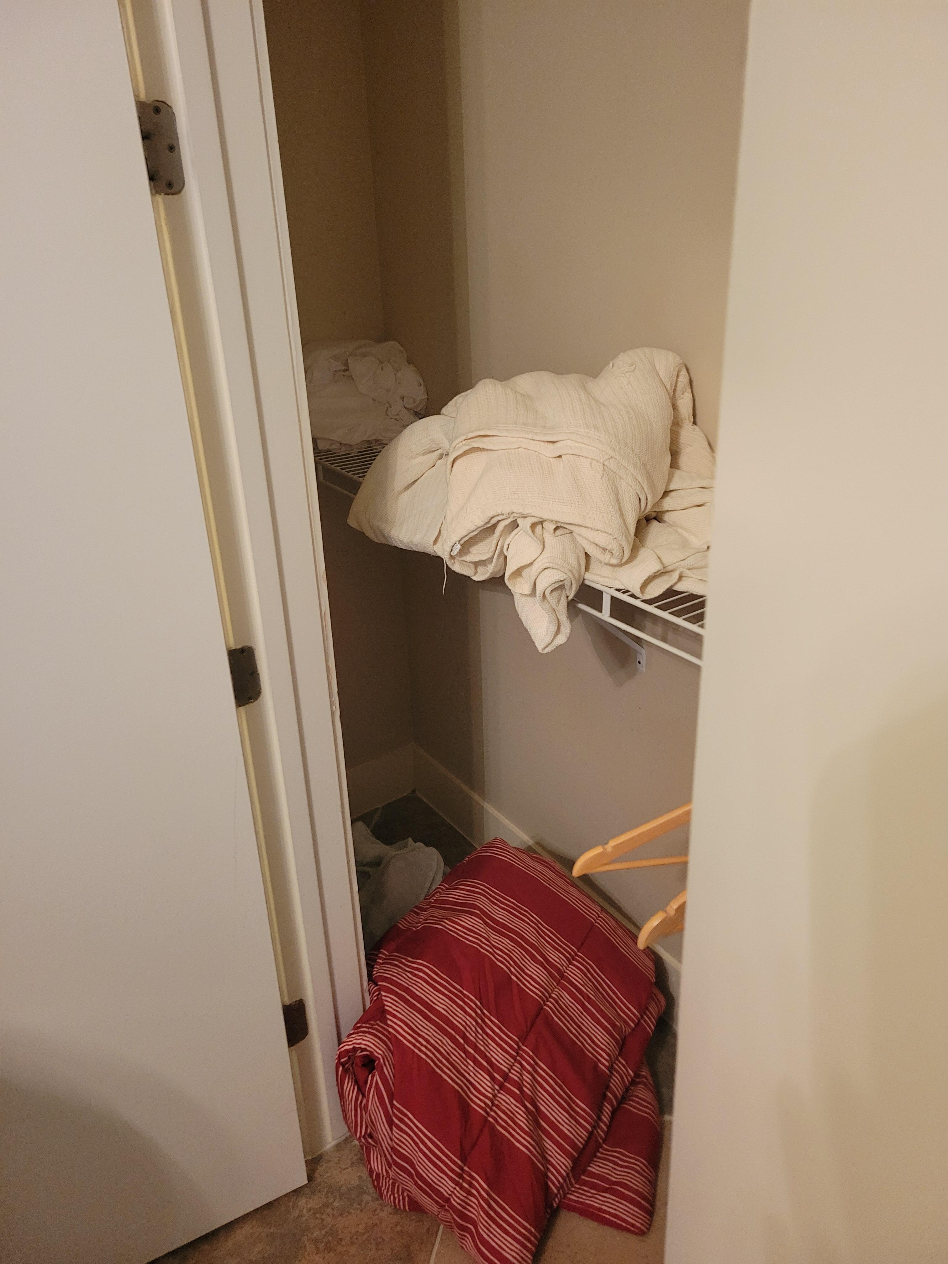 "Clean bedding" on closet floor 