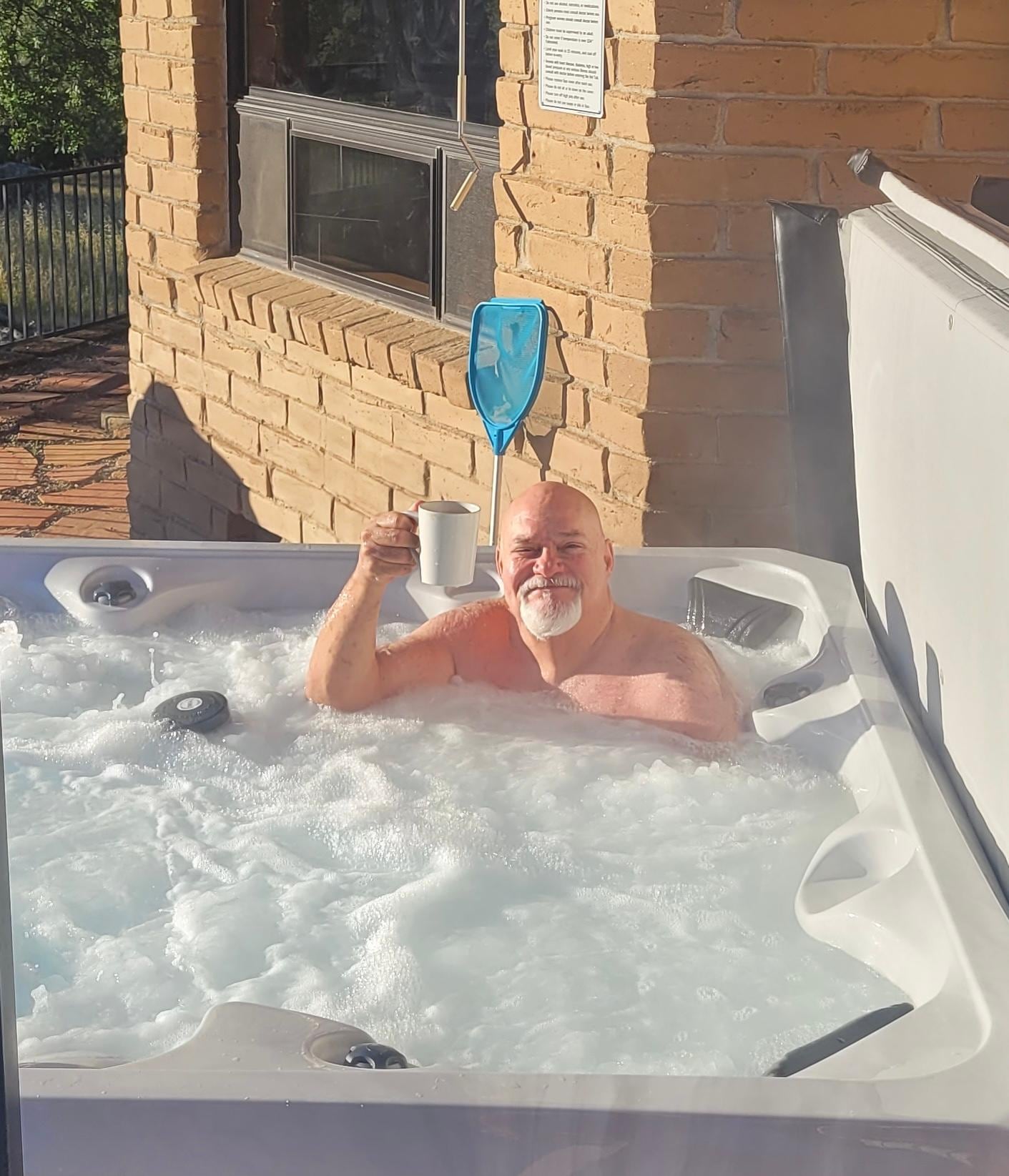 Coffee in the hot tub with mountain views