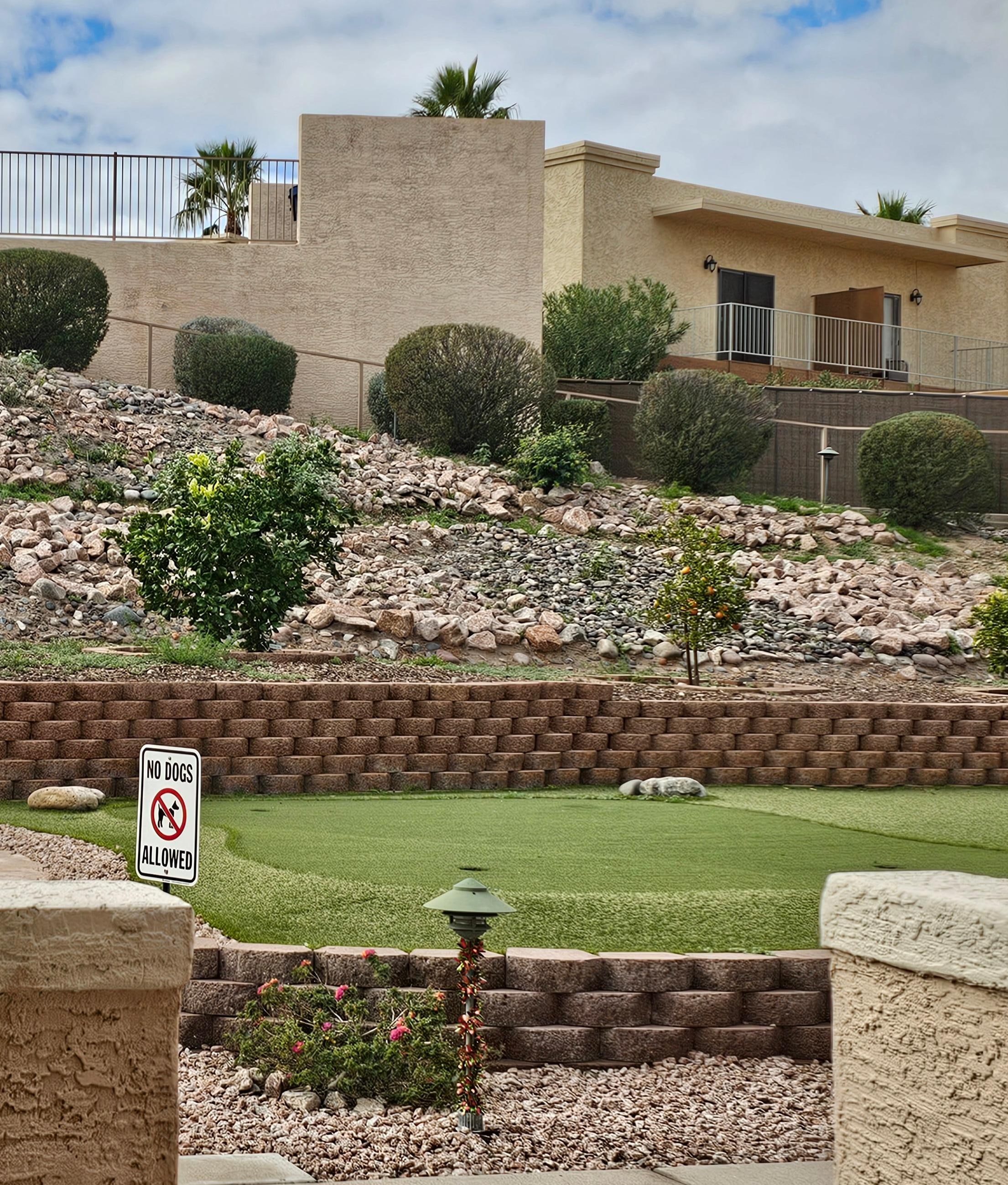 Putting green located near patio