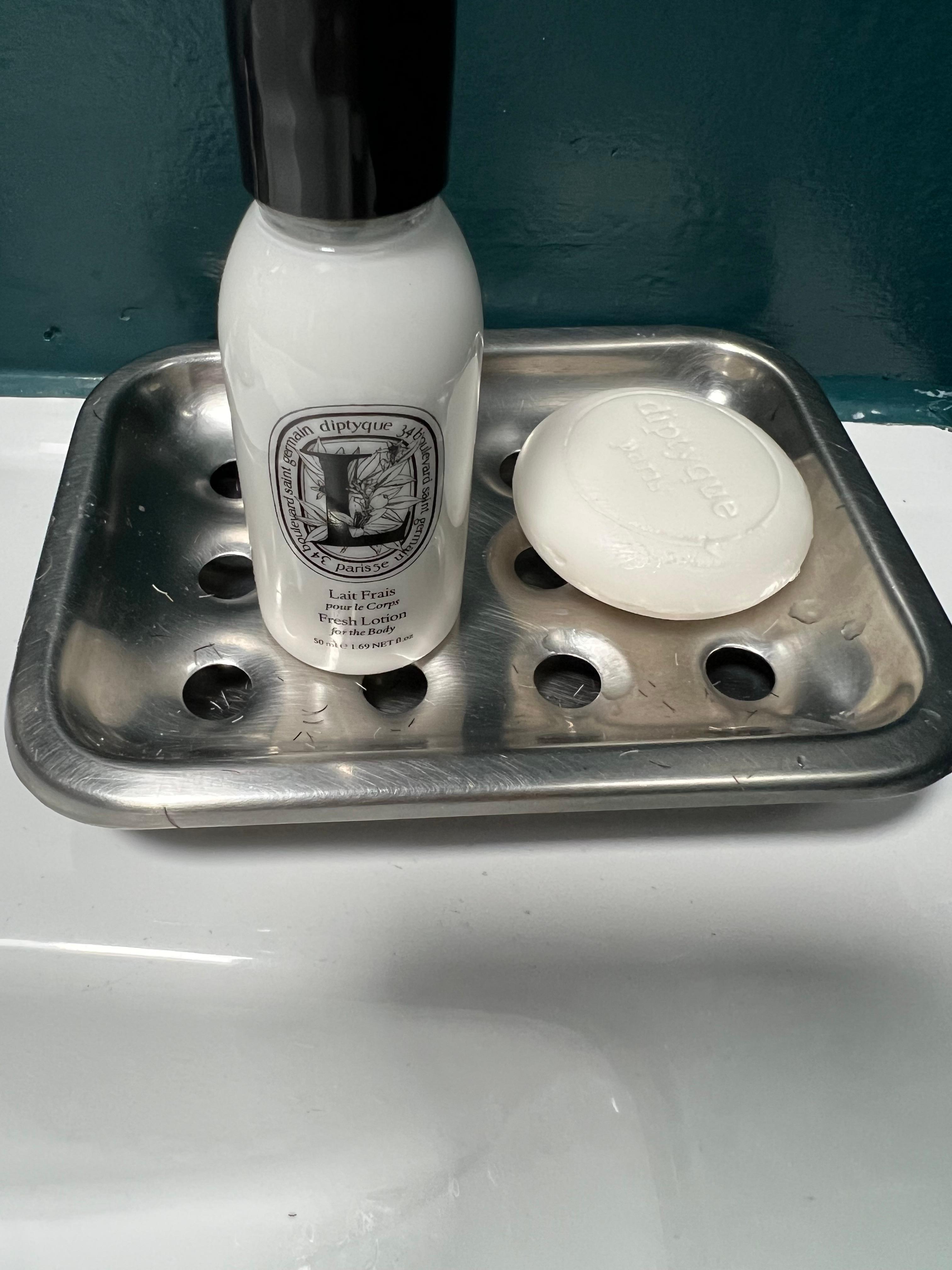 Previous guest’s beard shavings all over soap dish.