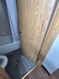 Holes in the bathroom door