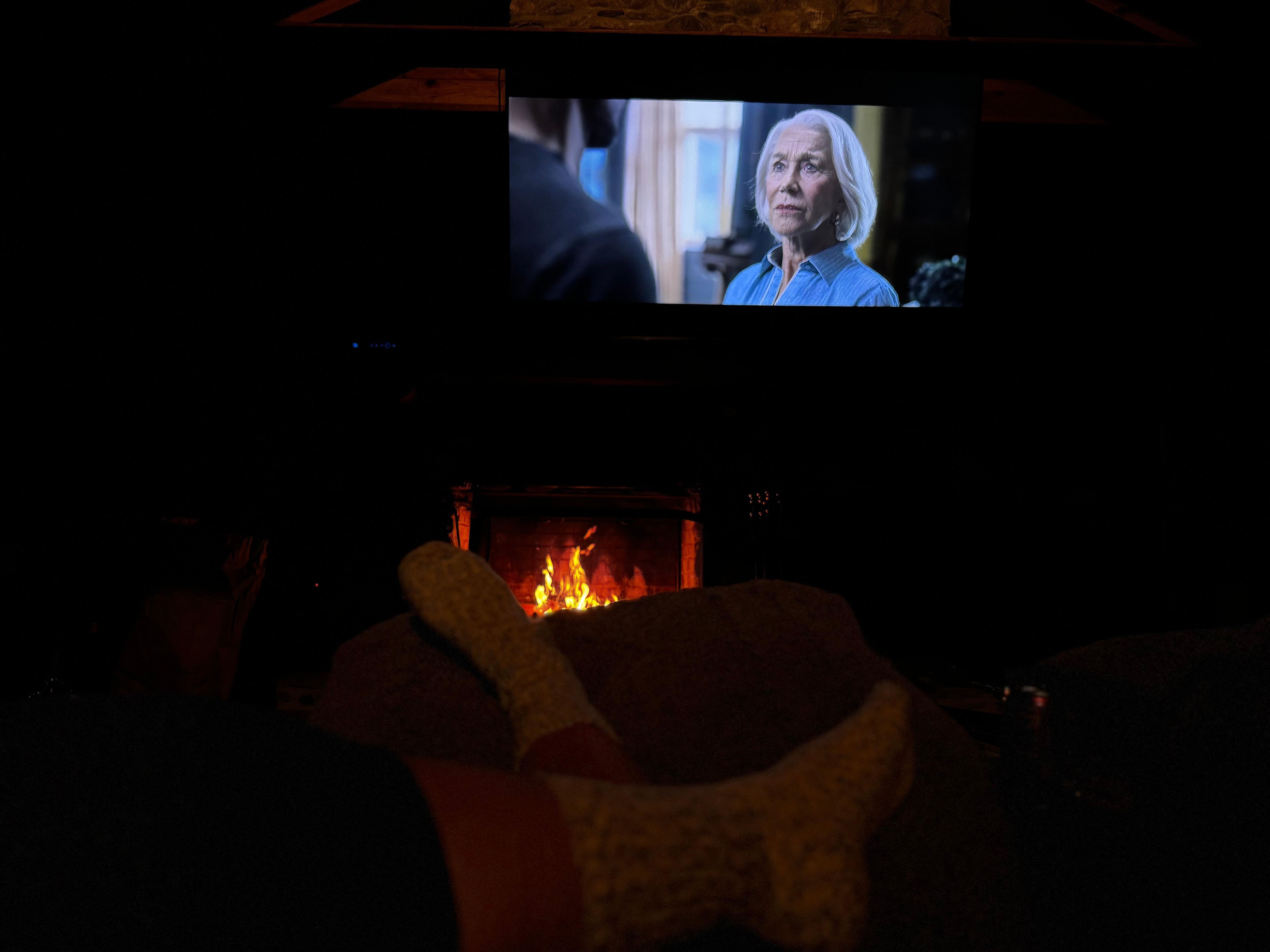 Rainy night watching a movie by the fire. 